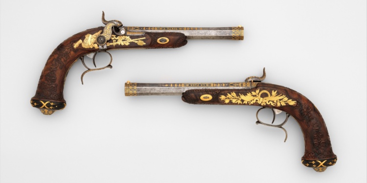 A pair of percussion target pistols.