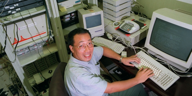 An office worker looking happy with dial-up internet.