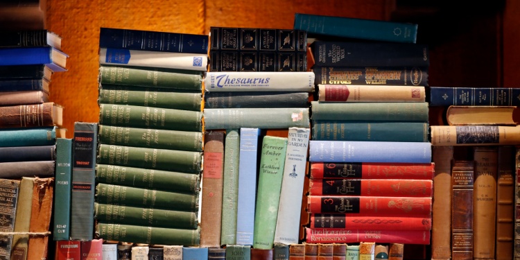 Stacks of books in the library.