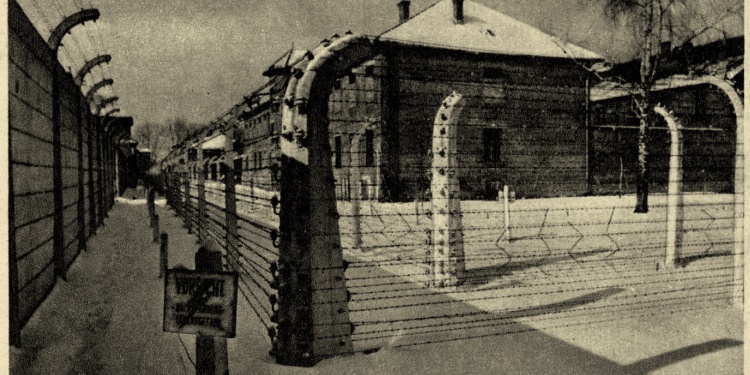 A black and white photo of Auschwitz.