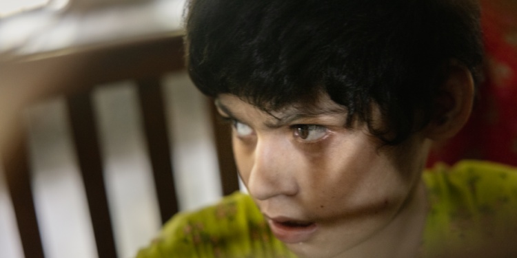 A teenager looking a little bit disturbed.