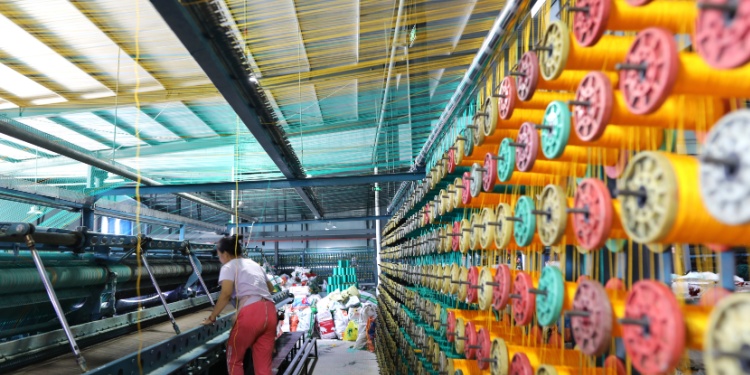 A worker in a nylon factory.