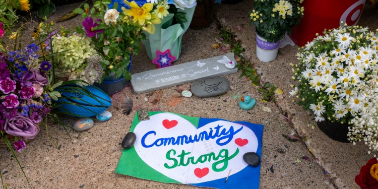 Flowers laid at a memorial service.