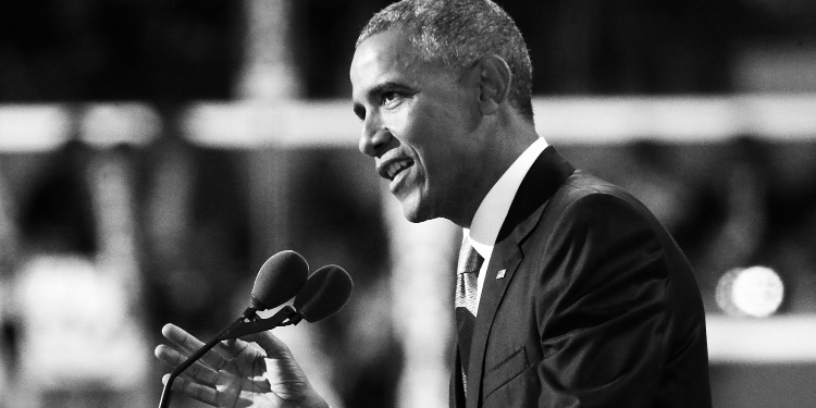 A retro photo of president Barack Obama at a conference.