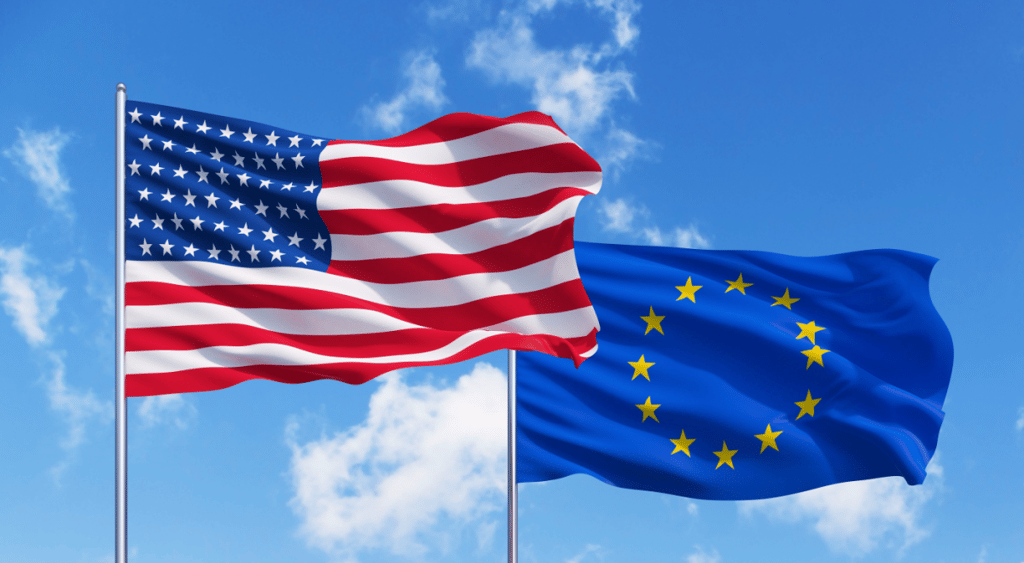 EU and US flags blue sky background