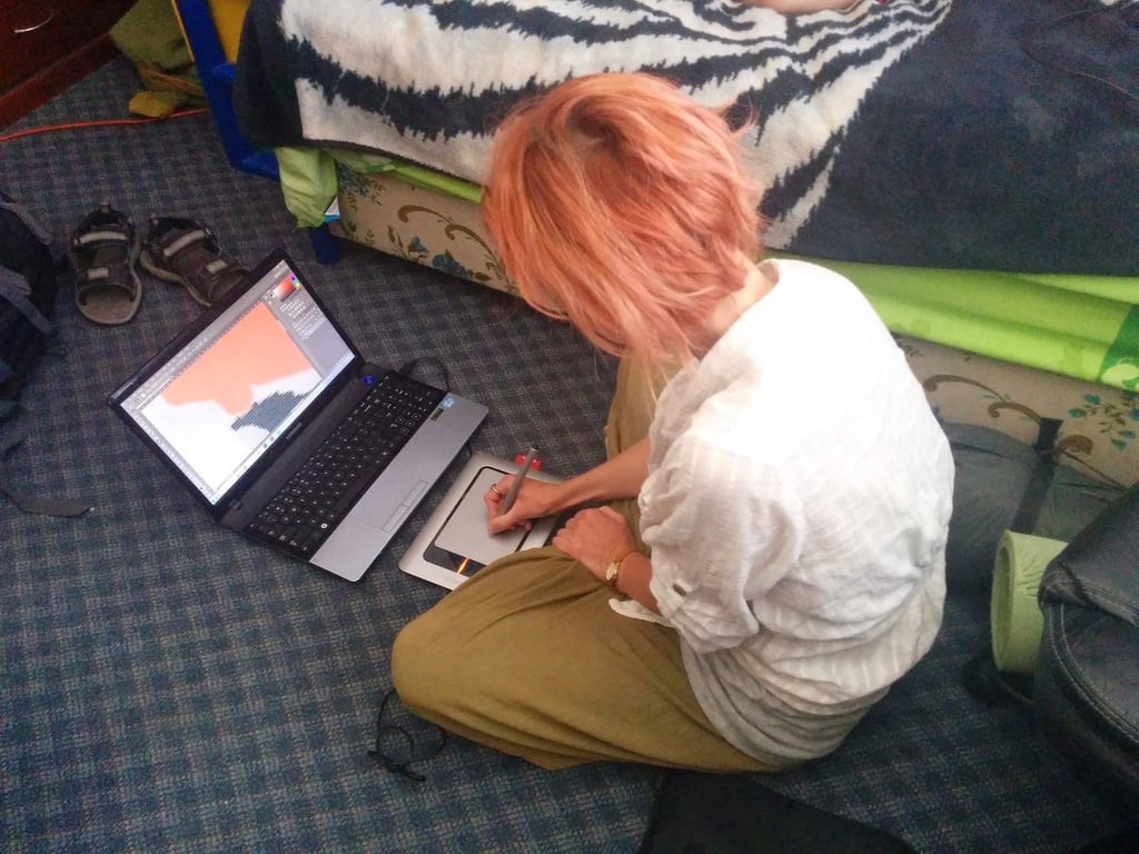 Photo editing on a floor in the shared bedroom, Mexico City, Mexico