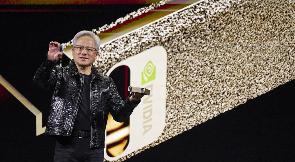 Nvidia's Jensen Huang  holding Project Digits computer