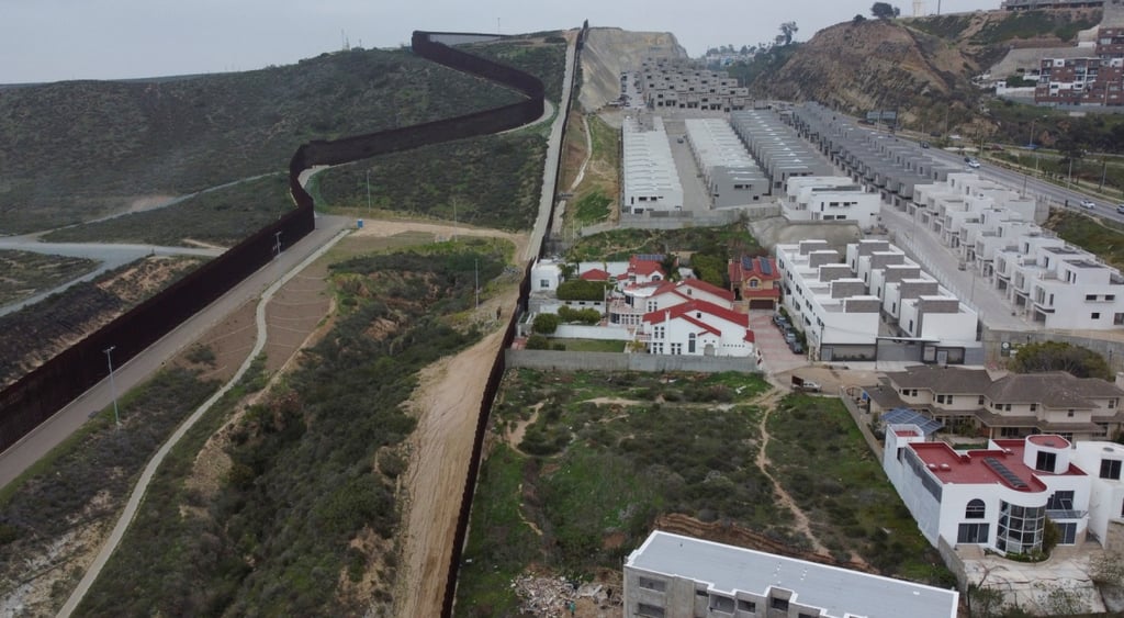 US Mexico border wall wide shot