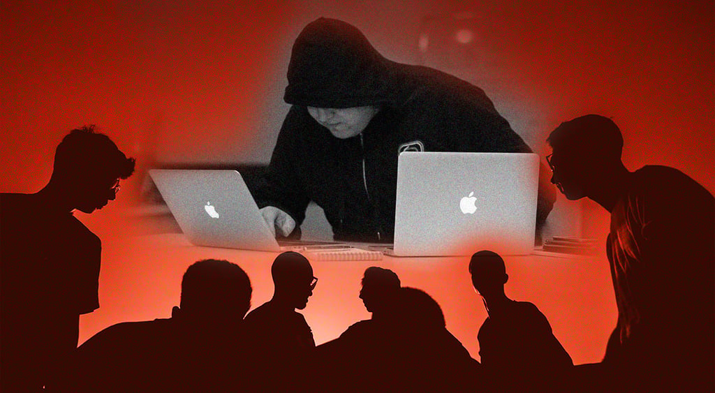 Hacker attacker surrounded people
