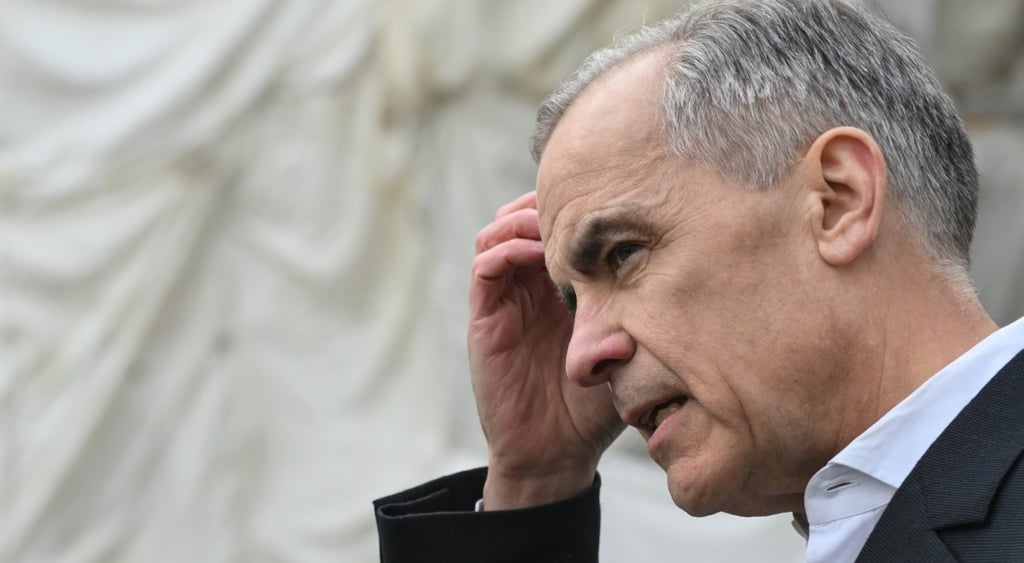 Mark Carney scratching his head.