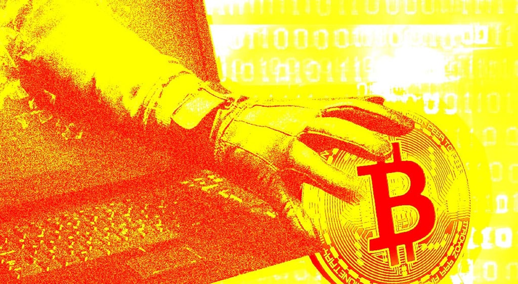 hand coming from laptop screen and stealing a bitcoin