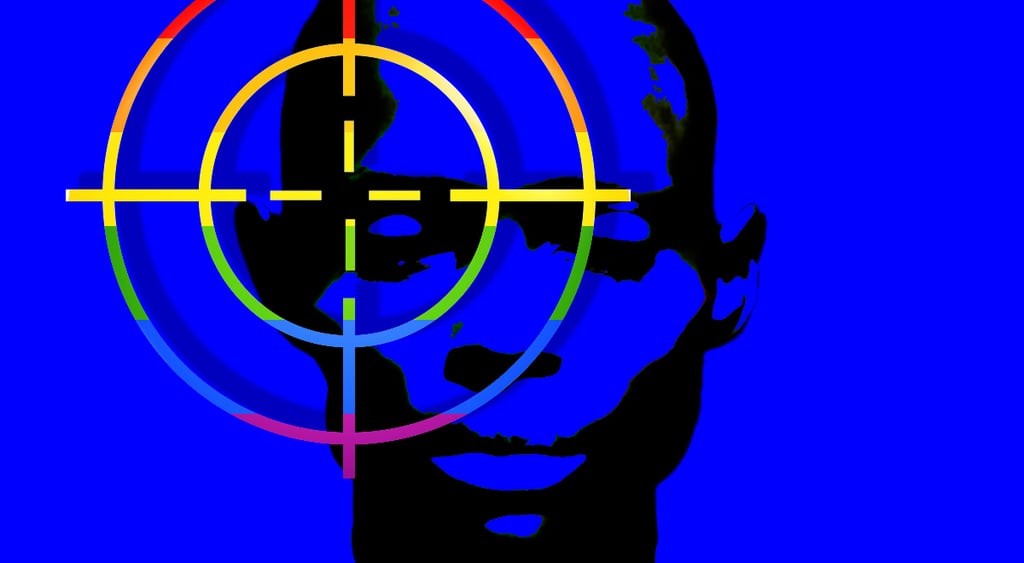 person in back, blue background, target with lgbtq colors