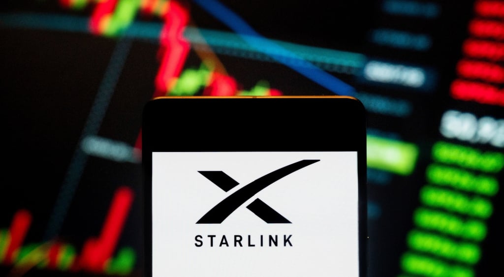 The Starlink logo on a colorful dashboard.