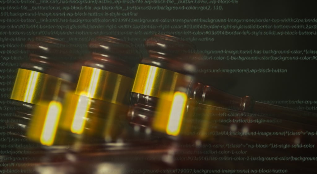 four brown and gold court gavels with digital text