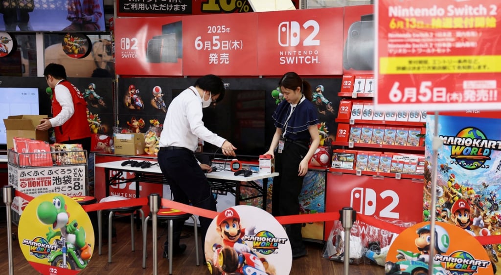 nintendo switch 2 red banner with two people and super mario kart