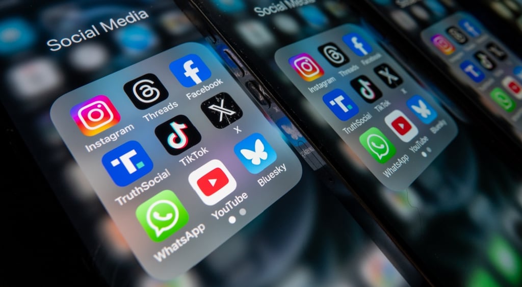 instagram, whatsapp, bluesky, facebook, x icons on screen