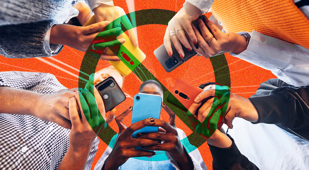 A circle of teens on their smartphones.