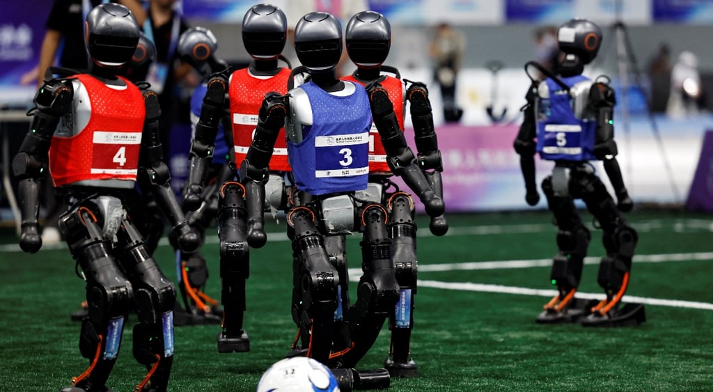 Booster Robotics T1 humanoid robots in 5-on-5 socccer/football match in Beijing robot games