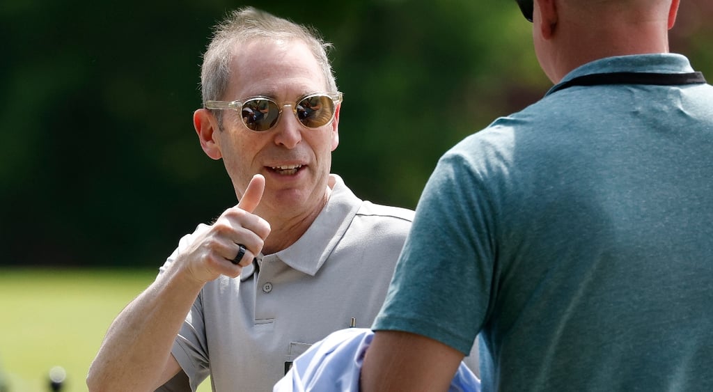 Amazon CEO Andy Jassy giving a thumbs up