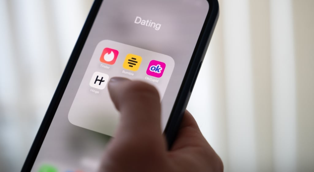 A smartphone and dating apps icons