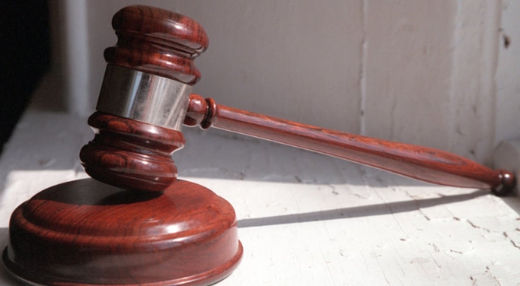 A judge's gavel on a table