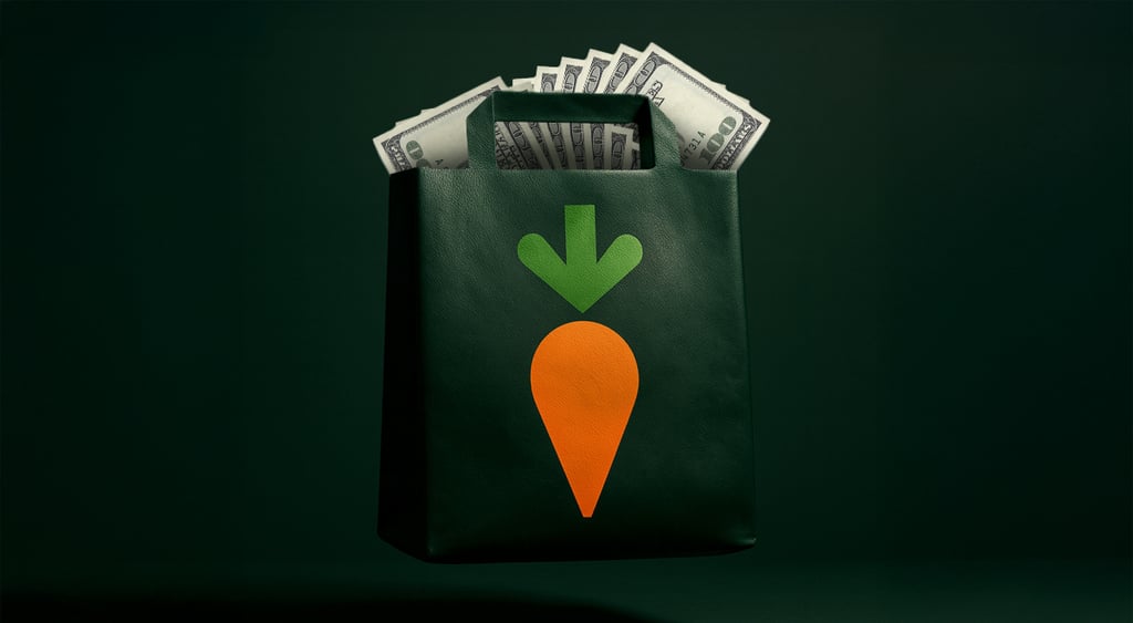 A black bag full of money with an image of a carrot on it