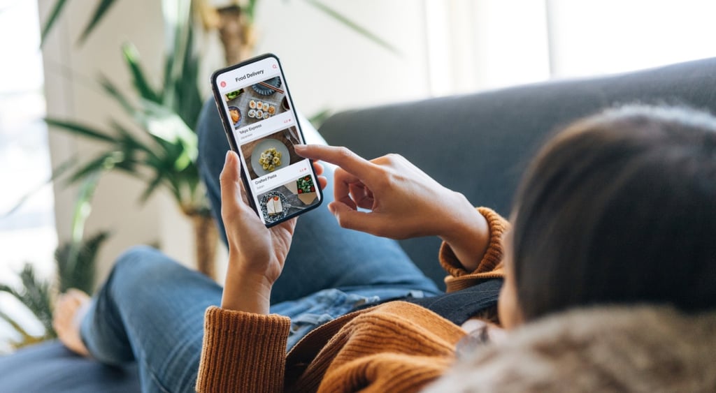 Woman uses food delivery app