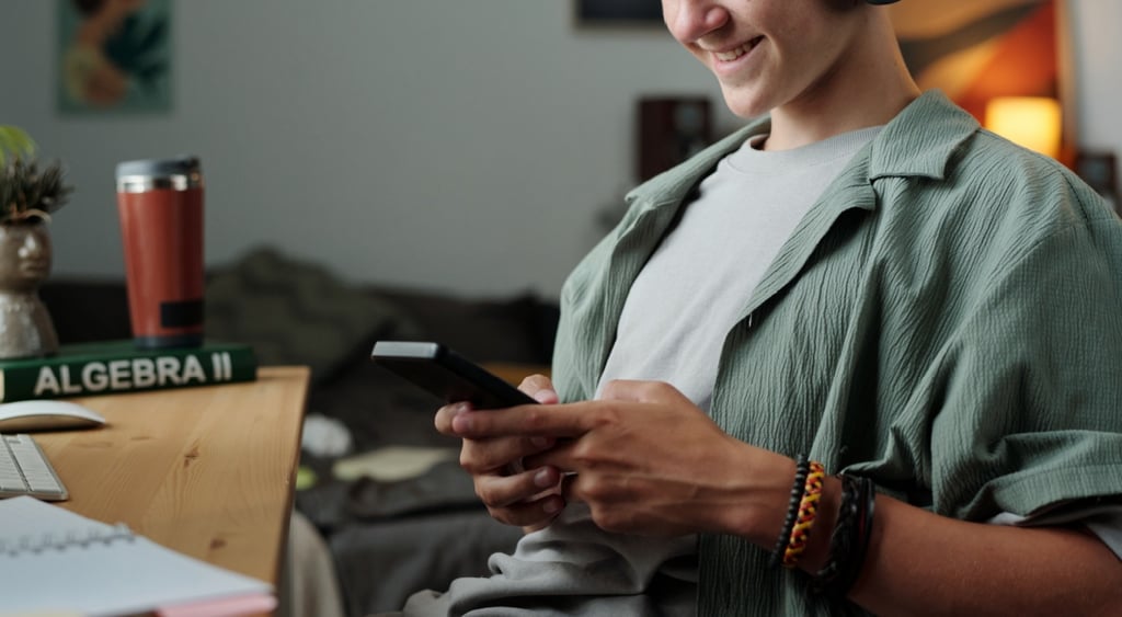 tenage_boy_scrolls_algebra_smartphone