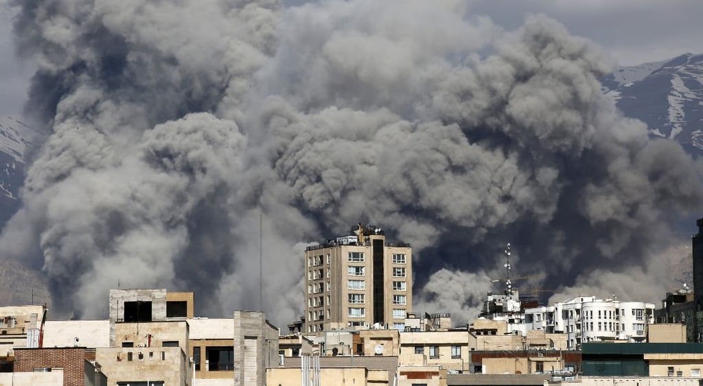 Smoke rises from the area in Tehran after it was targeted