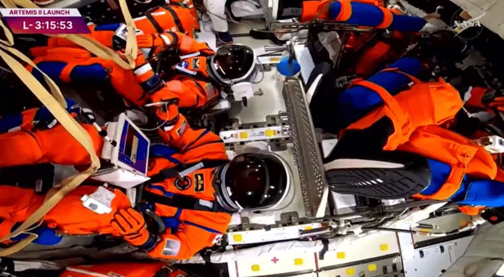 Artemis II crew strapped in