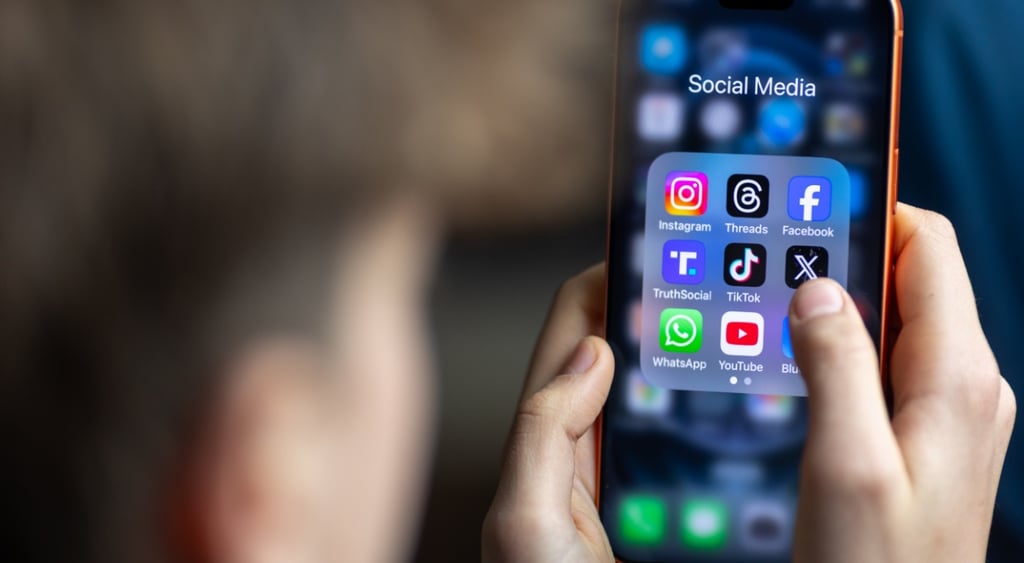 young teen boy, grown hair, iphone black screen with Instagram, Youtube, Facebook ,TikTok apps