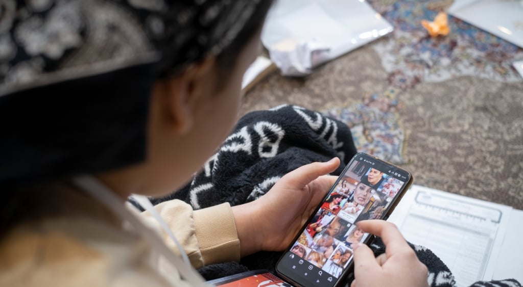 iranian girl, smartphone screen, lots of images, scarf on head,