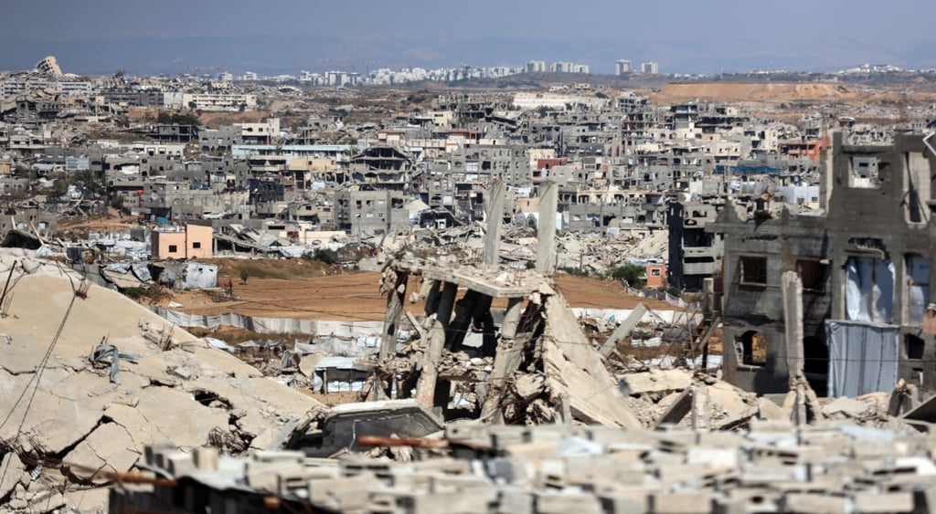 gaza strip, blue-grey sky, destroyed buildings, no people, ruins, broken windows