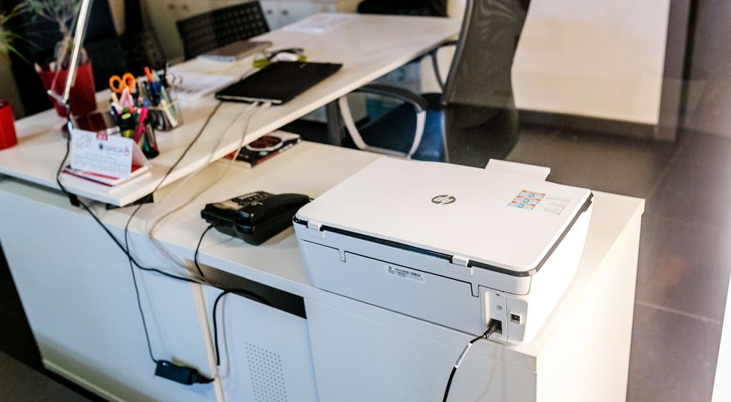 HP printer on a white office table