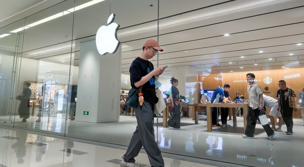 white asian man, apple store, glass window wall, smartphone scroll, grey interior