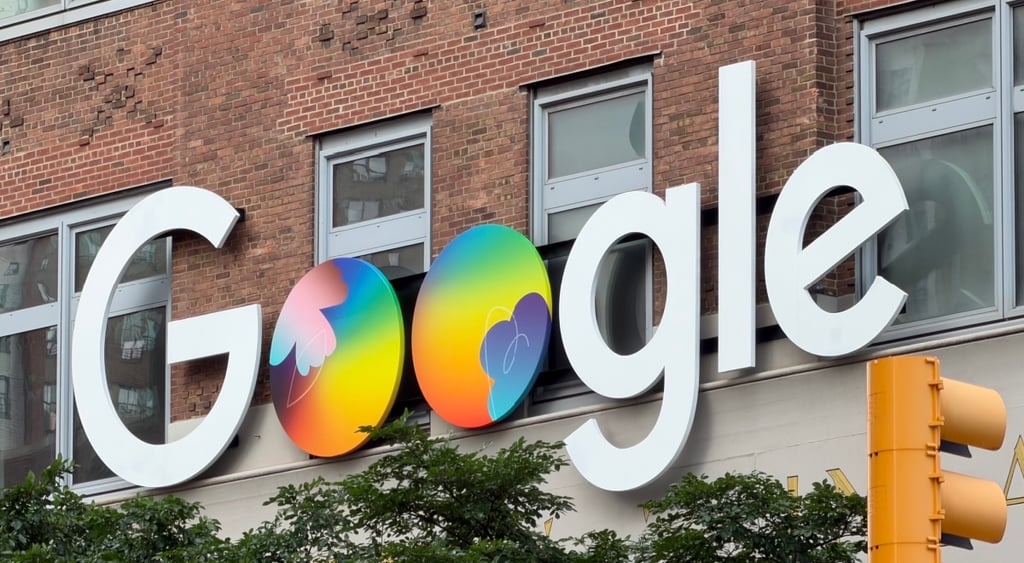 google logo, two colorful globes instead of two o's, yellow traffic light, brick building