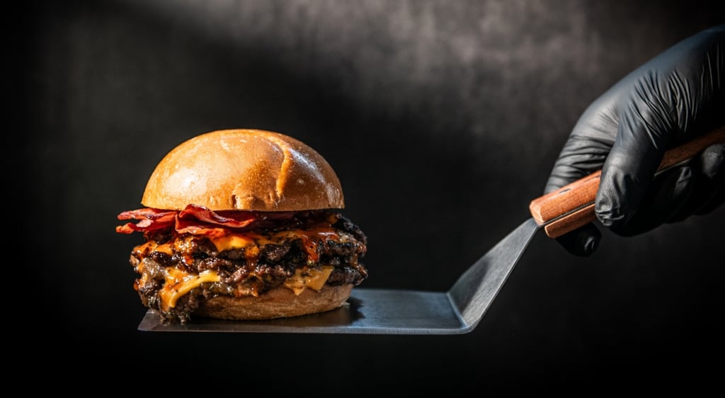 burger on metal spatula,