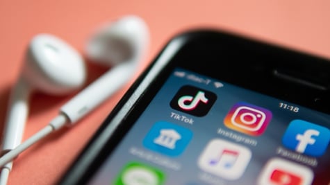 Mobile phone with TikTok app on it