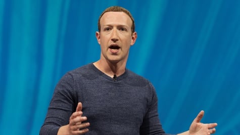facebook CEO zuckerberg speaking on stage