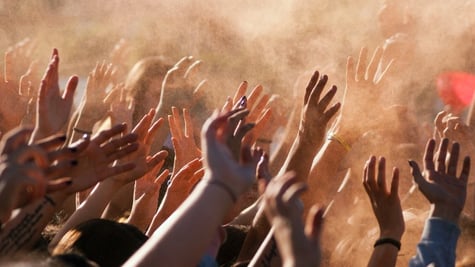 Crowded people hands up