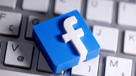 Facebook logo on a keyboard