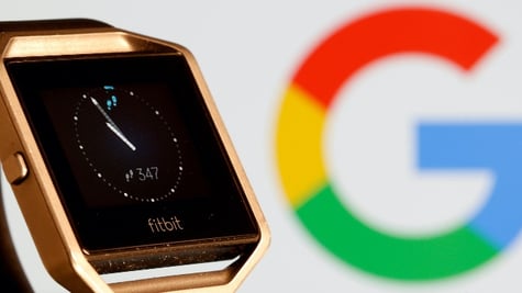Fitbit Blaze watch is seen in front of a displayed Google logo in this illustration picture taken, N