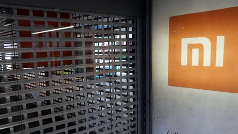 Xiaomi logo is seen on a brand's store which closed during a lockdown, imposed to prevent the spread