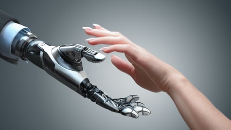 Ai hand and a human hand