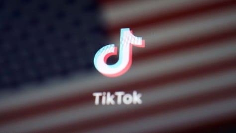 tiktok logo in the background of american flag