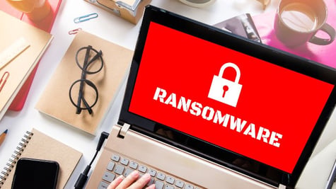 Locker and ransomware attack on laptop screen