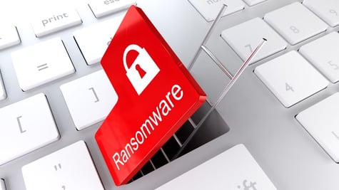 Opened red ransomware button on laptop with ladder going out