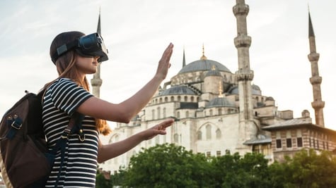 Girl with VR glasses travelling