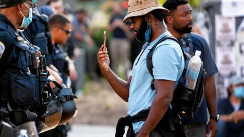 Traveler taking a picture of a police