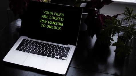 Ransom message on laptop screen